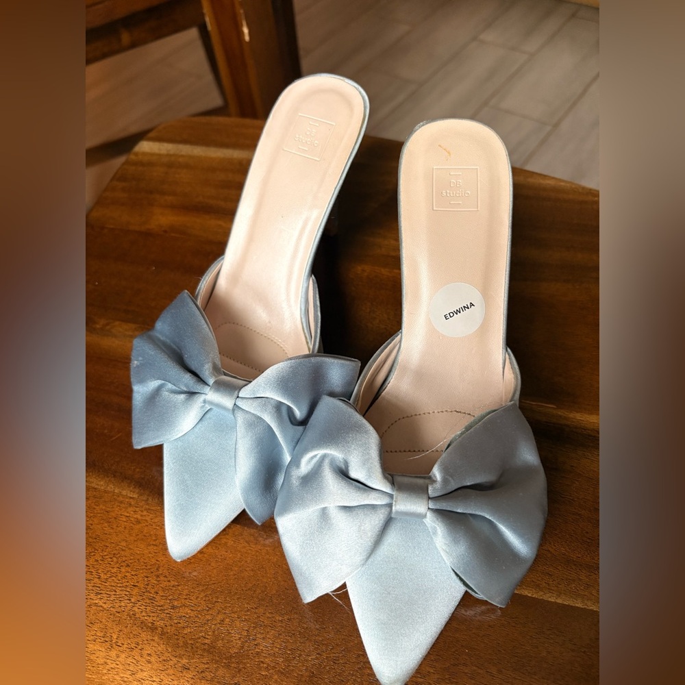 Edwin Satin Bow Pointed-Toe Mules in Light Blue